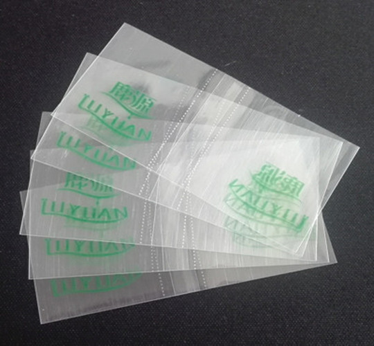 clear shrink bands with green logo